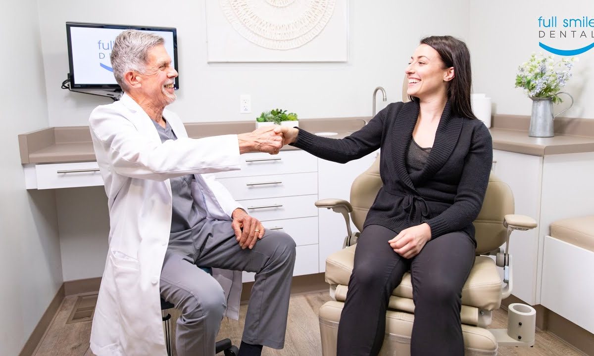 Chicago dentist comparing porcelain vs composite veneers at Full Smile Dental Worth Illinois